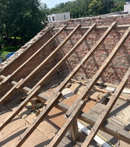 Rénovation complète d'une toiture en tuiles avec isolation en sarking à Malines 