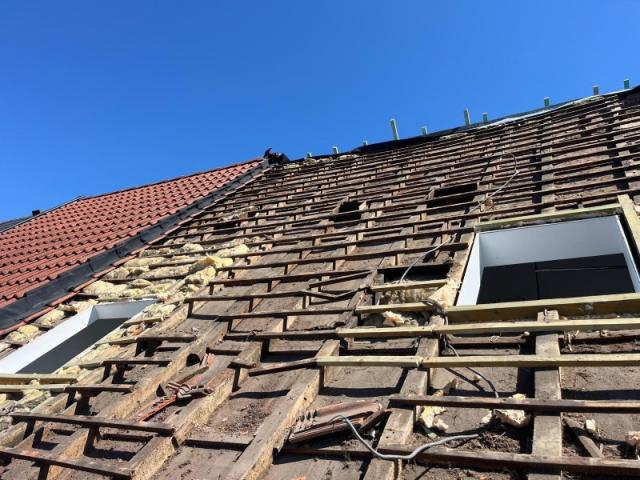 Rénovation complète d'une toiture en tuiles avec isolation en sarking à Malines 